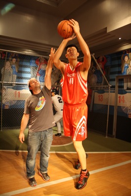 Trying to take the ball from Yao Ming