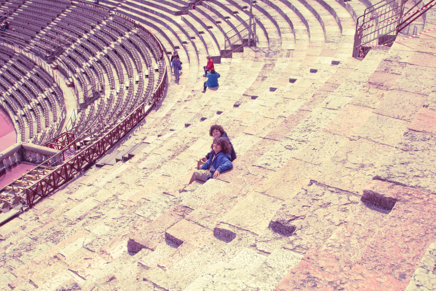 Taking a break on the steps on a 1st century Roman amphitheatre, as one does.